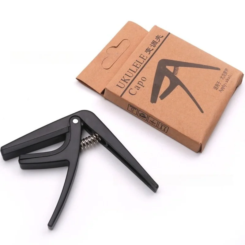 Ukulele-Transpositionsklemme Ukulele-Stimmklemme Stimmhilfe in Box aus Metall, die die Saiten nicht verdrücken