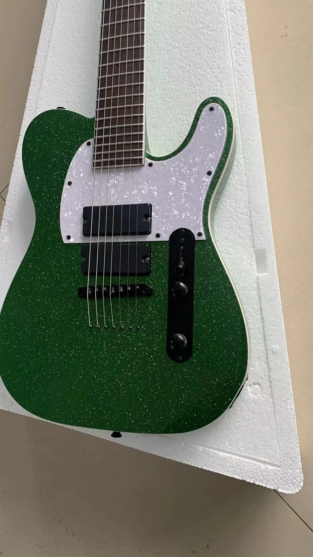 Factory manufacturing high-grade 7 string electric guitar, large particle 7 color sequin green, free mail