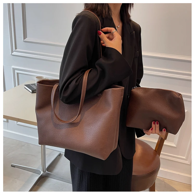 

2025 new Korean niche design soft collapse lychee grain shoulder bag large capacity commuter bag simple atmosphere Tote bags