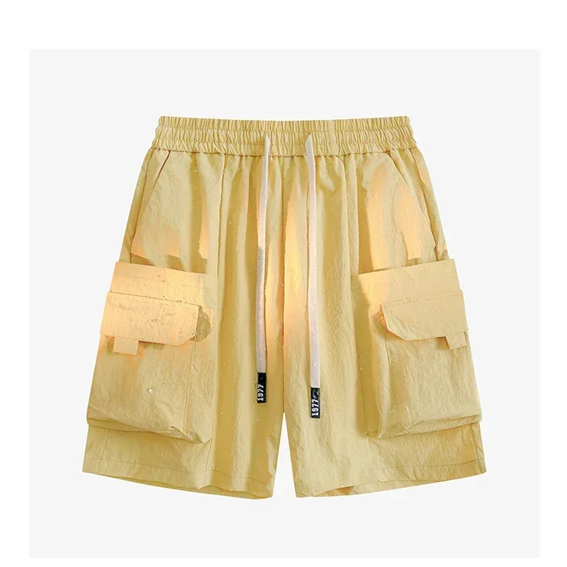 กางเกงขาสั้นผ้าไอซ์ซิลค์แห้งเร็วสำหรับผู้ชายสินค้าใหม่อเนกประสงค์สีพื้นทันสมัยและทันสมัยสำหรับฤดูร้อน