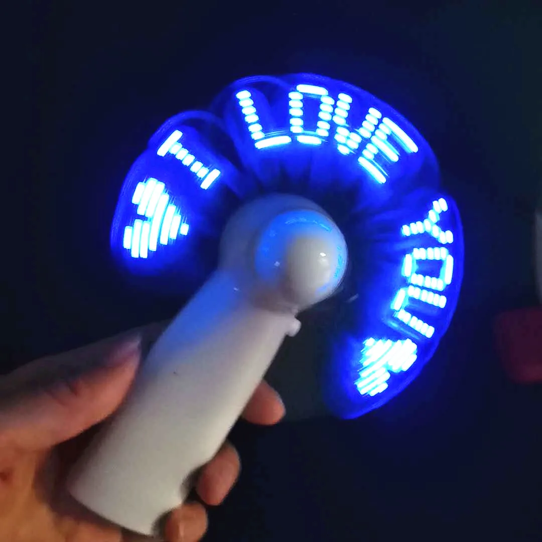 Ventilador eléctrico pequeño con letras luminosas, dispositivo de mano con pantalla de luz LED, ideal para ceremonias, creativo