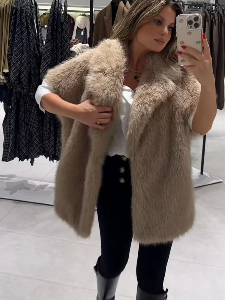 

﻿ 2025 новейший женский модный меховой жилет, пальто, зимняя мода, теплый жилет без рукавов с лацканами из искусственного меха, элегантный свободный жилет, куртка