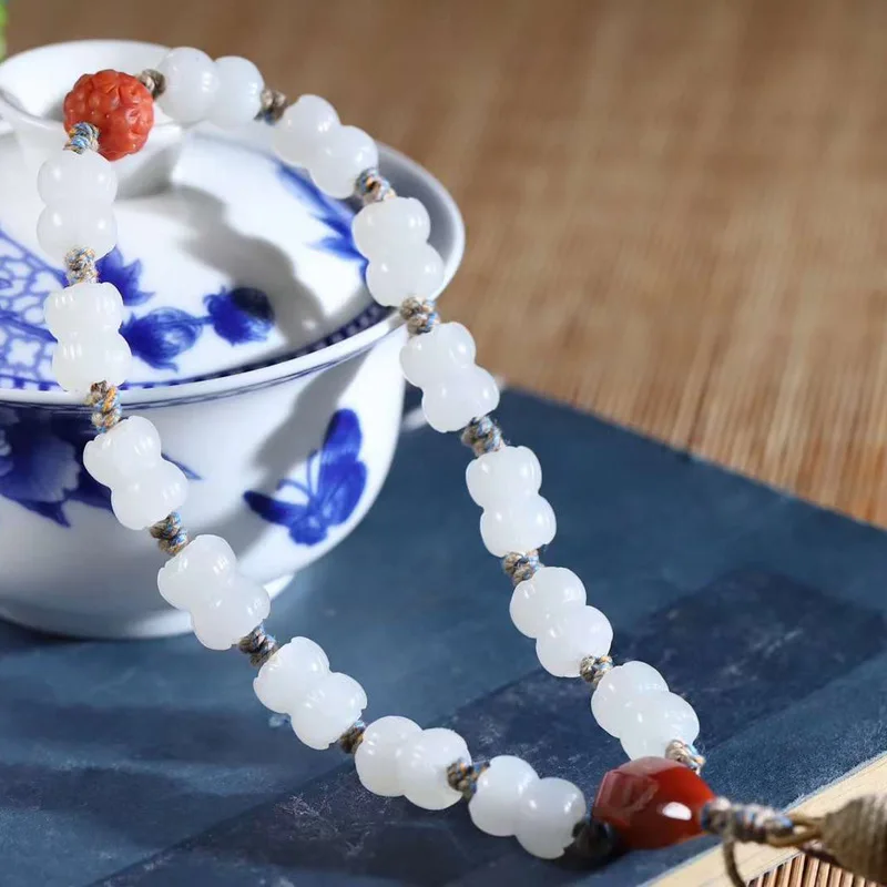 

Natural Hetian Qinghai Material Suet Grade White Jade Twin Lotuses Handheld Bracelet Send Certificate