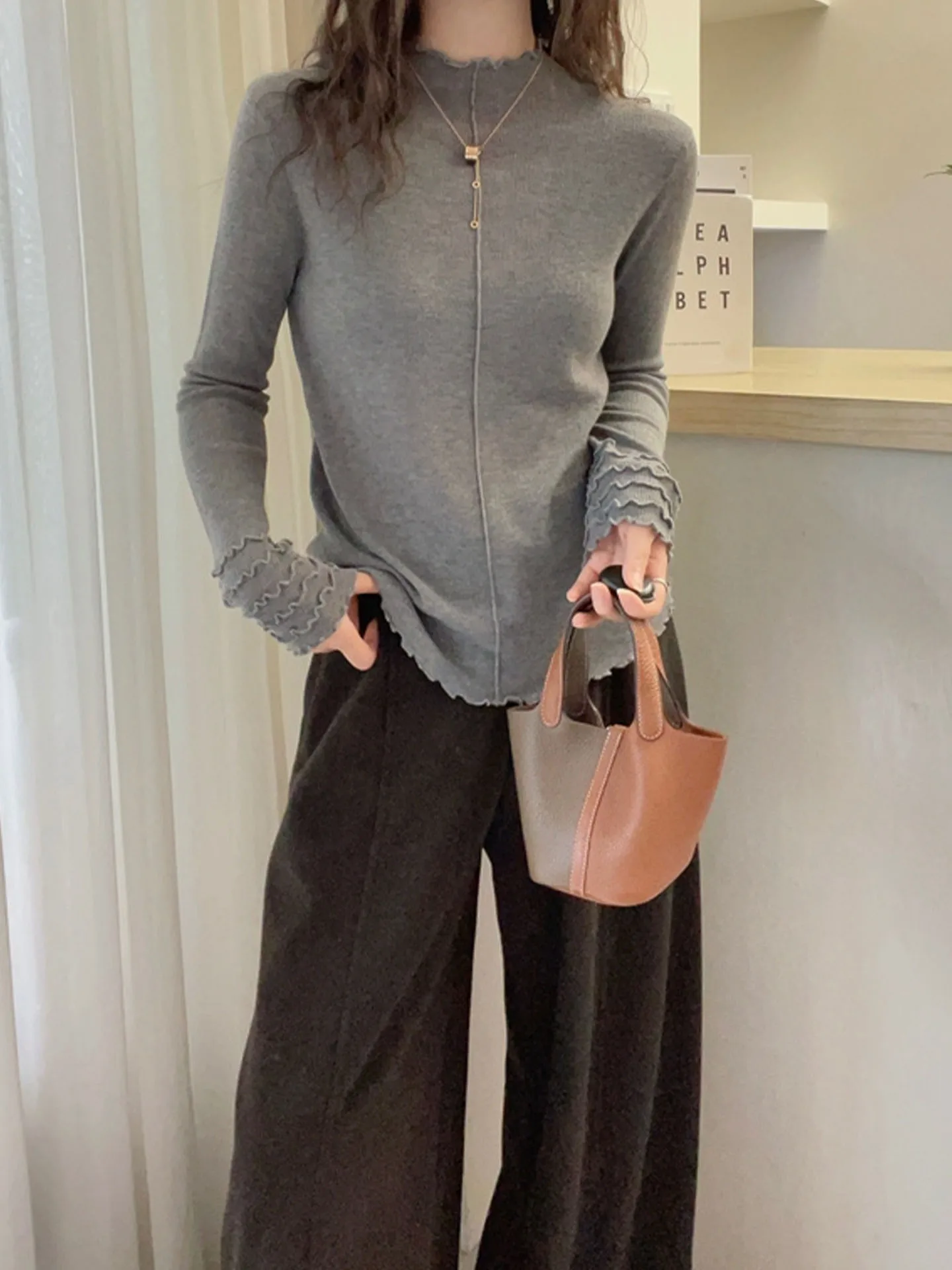 Winter Women's Slim Fit Knitted Long Sleeve Overhead Top Half High Collar Design Sense Base Shirt Fashionable Slimming Top