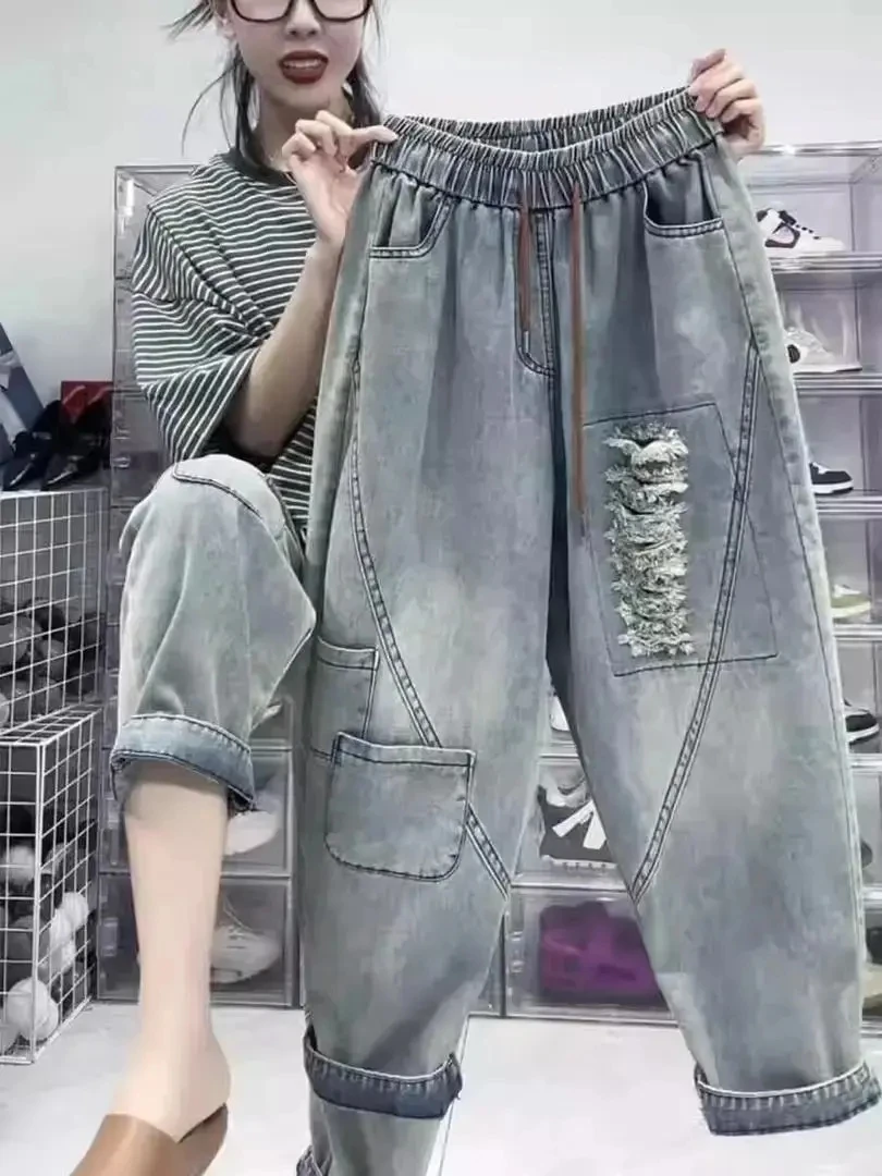2026 Spring Autumn New Korean Fashion Women Elastic Waist Cotton Denim Harem Pants Hole Design Vintage Blue Loose Jeans