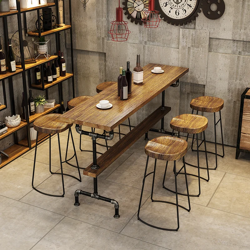 Industrial style retro water pipes, iron art solid wood bar tables and chairs, milk tea shop bars, high legged tables and chairs