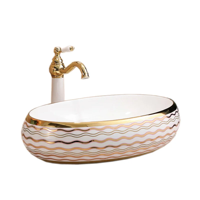 

Сантехника: элегантная керамическая раковина с узором «водные волны» и золотым покрытием для ванной комнаты