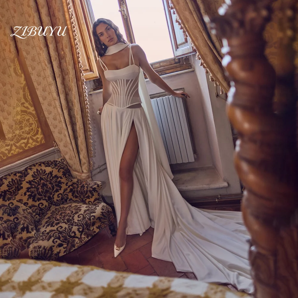 

Свадебное платье ZIBUYU на заказ: элегантное, роскошное, с тонкими бретелями, без спинки, квадратным вырезом, из атласа, фасон «русалка», без рукавов, с высоким разрезом