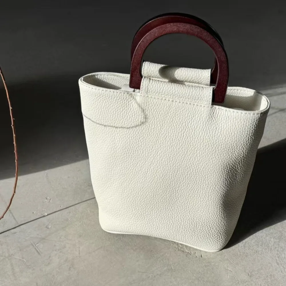 

New Niche Design Wooden Handle Handbag Retro Simple Mini Shoulder Texture Unique Fashion Simple Casual Daily Fashion Versatile