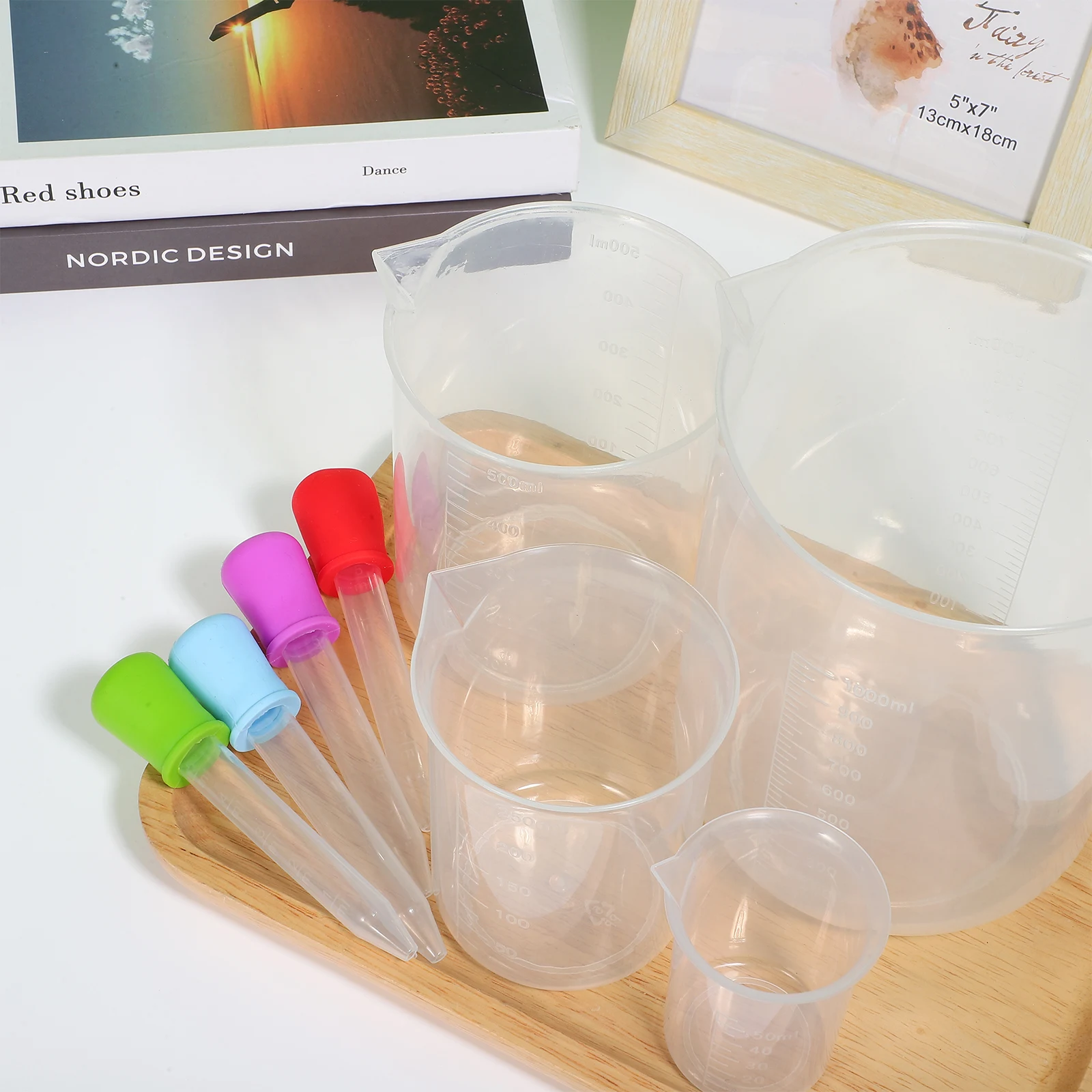 

4Pcs Measuring Cup Set Food Grade Plastic Stackable Liquid Measuring Jugs Clear Scale Large to Mini Sizes Kitchen