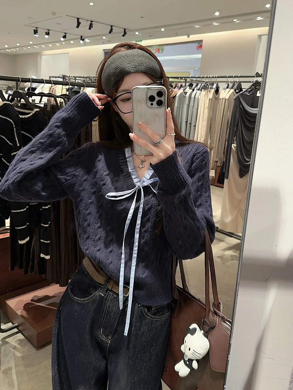 Damski sweter z dzianiny, koreański styl, długi rękaw, zimowy, niebieski, delikatny krój, dopasowany, casualowy, z ozdobnym węzłem.