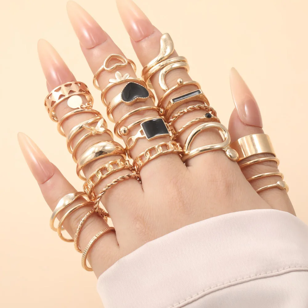 

27PCS Vintage Heart Snake Butterfly Rings Set for Women Finger Ring Jewelry Gift New Metal Gold Plated Geometric Hollow