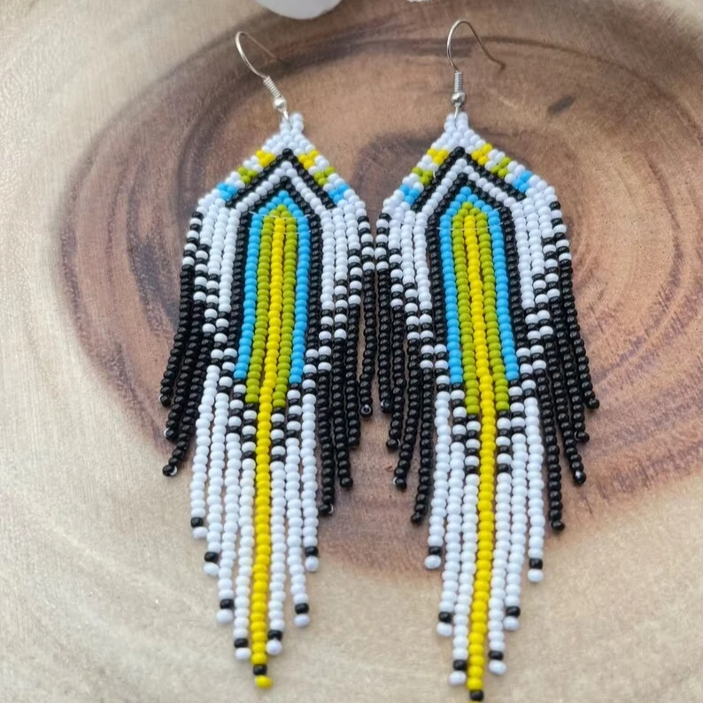 

Rice bead earrings Tassels Geometry Architecture Bohemia Pattern Hand weaving Alloy Fashion Female Simple Beaded earrings
