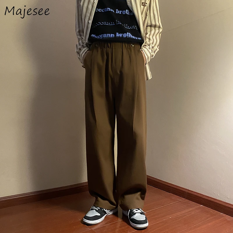 Pantaloni da abito casual a gamba larga da uomo morbidi sulla pelle tinta unita larghi estivi pantaloni maschili alla moda tutto-fiammifero stile coreano chic