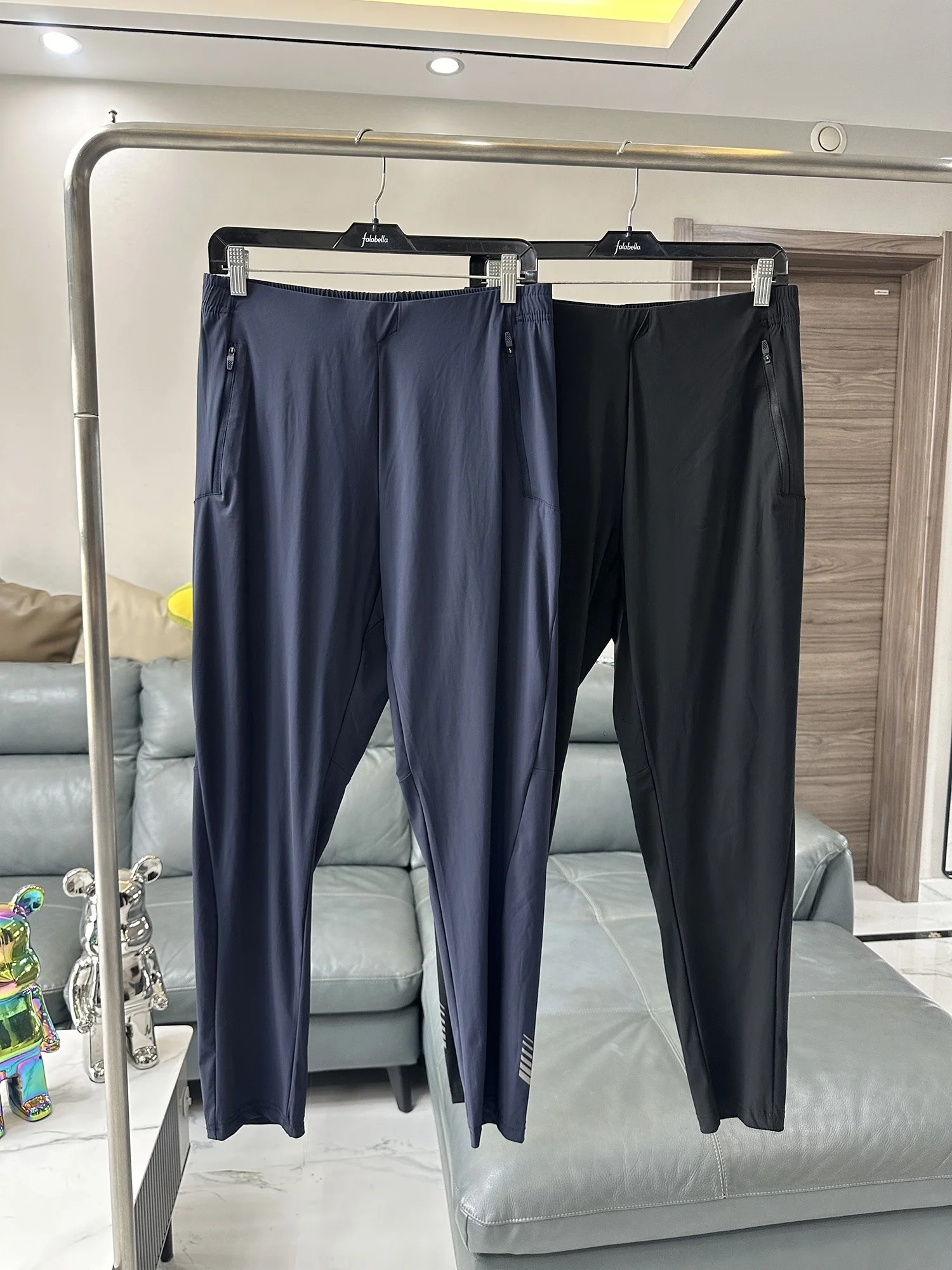 

Men's Casual Quick-Dry Sports Pants Four-Way Elastic Outdoor Lightweight Breathable Sweat-Wicking Laser-Pore Men's Leisure Tr...