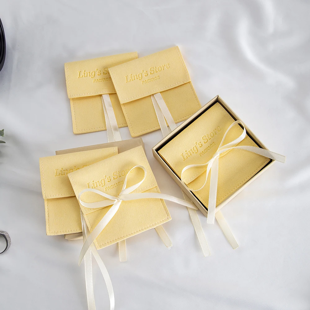 50 Uds. De joyería amarilla personalizada, bolsa con cinta de microfibra, sobre, bolsa con solapa, regalo de recuerdos de boda, embalaje de caja de aceite cosmético para dulces