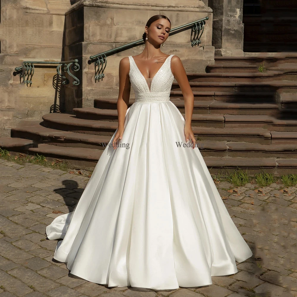 Vestido de novia de satén sin mangas con cuello en V profundo, vestido de baile de princesa, trapeador esponjoso y bonito, hombros descubiertos, lujoso y fascinante