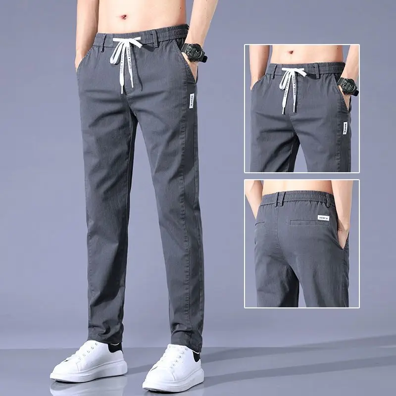 

Fashion Casual Men Solid Straight Pants Spring Autumn New Streetwear Male Clothes Denim Elastic Waist Loose Sports Trousers 38