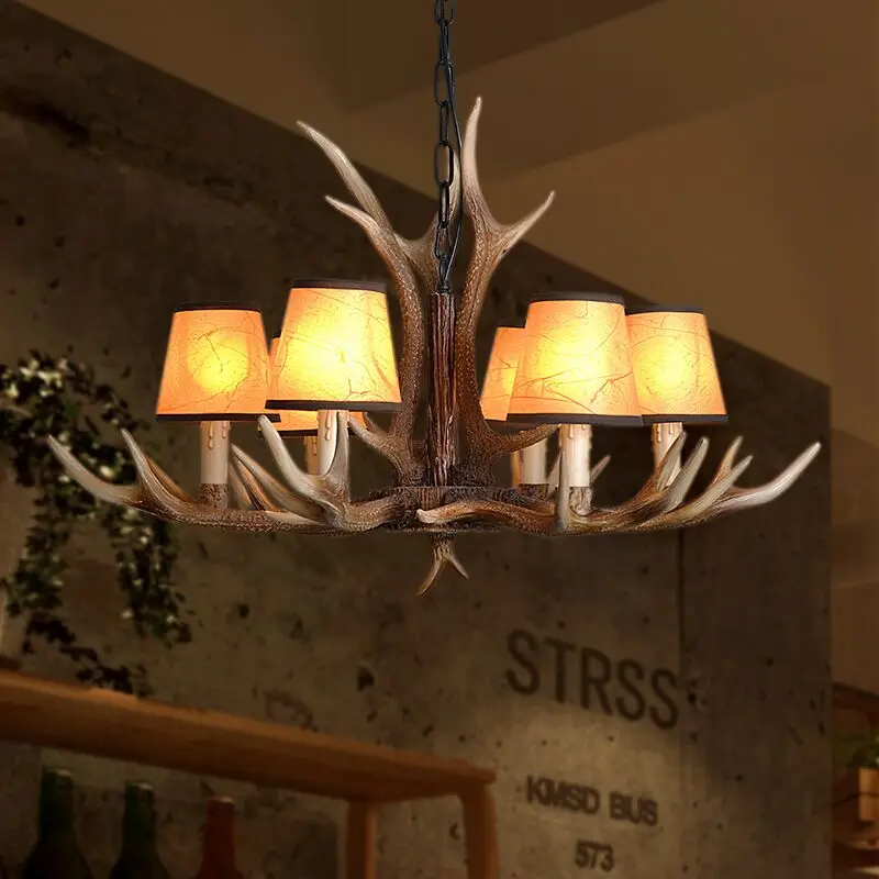 

Industrial style wooden cabin resin pendant lamp, living room decorative lamp, antler lamp, retro leisure bar pendant lamp.