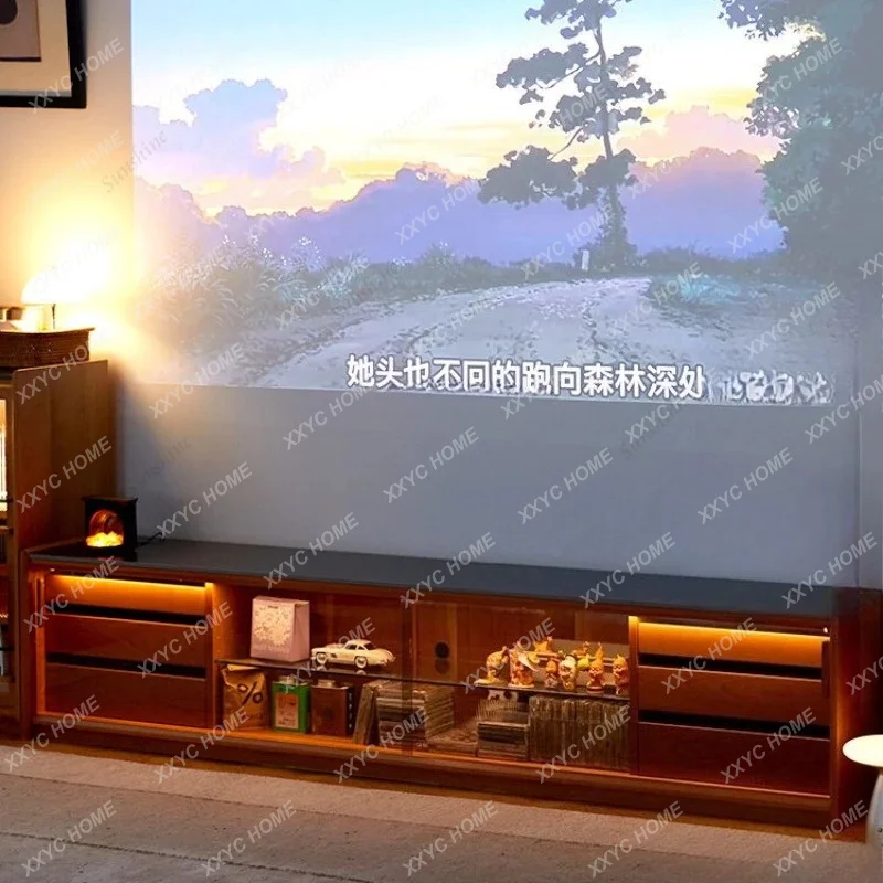A Floor-to-ceiling log wind coffee table combination storage rock slab TV cabinet