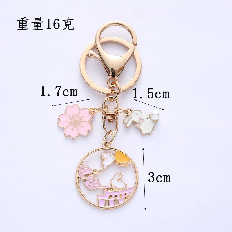 Liontin Anjing Cinta Bintang Busur Cantik Gantungan Kunci Pasangan Tas Mobil Gantungan Kunci Jimat Bulan Kelinci Bunga Sakura Lucu Perhiasan Baru untuk Wanita