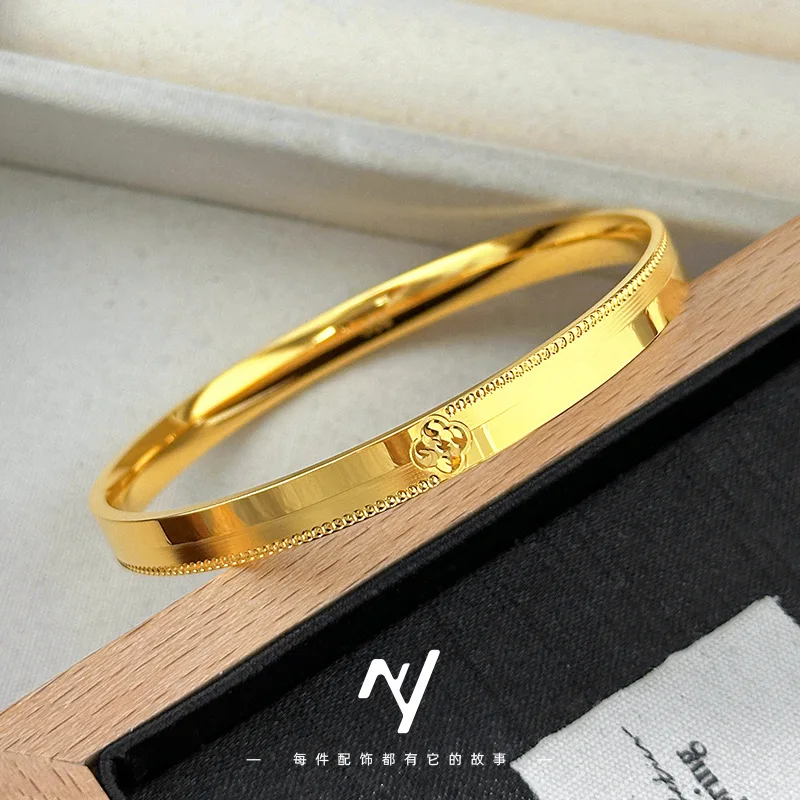 

999 real gold light luxury high-workmanship ice-breaking pattern four-leaf clover bracelet, solid smooth bracelet