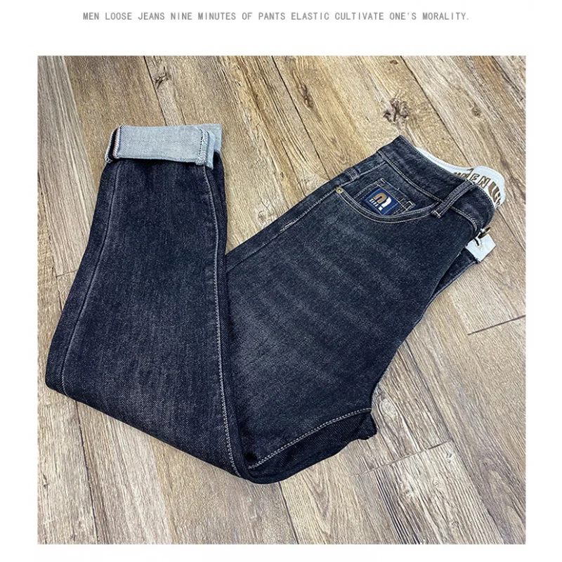 

2025 autumn new trend street small leg jeans men, simple and versatile, elastic tapered long pants