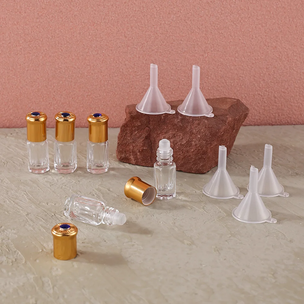 5 ชิ้น 3 มิลลิลิตรใสแปดเหลี่ยมขวดแก้วลูกกลิ้งเปล่า W/ฝาอัญมณีสีฟ้า 5 กรวยรีฟิลสำหรับน้ำมันหอมระเหยน้ำหอม
