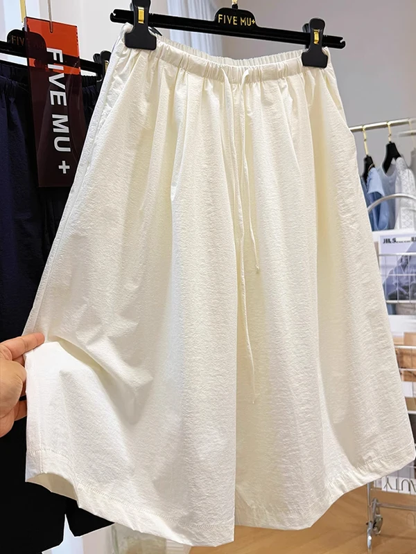 Wyszczuplające spodnie damskie z wysokim stanem, o kroju litery A, z szerokimi nogawkami, długość do połowy łydki, szybkoschnące, cienkie, letnie, codzienne spodnie do noszenia na zewnątrz.