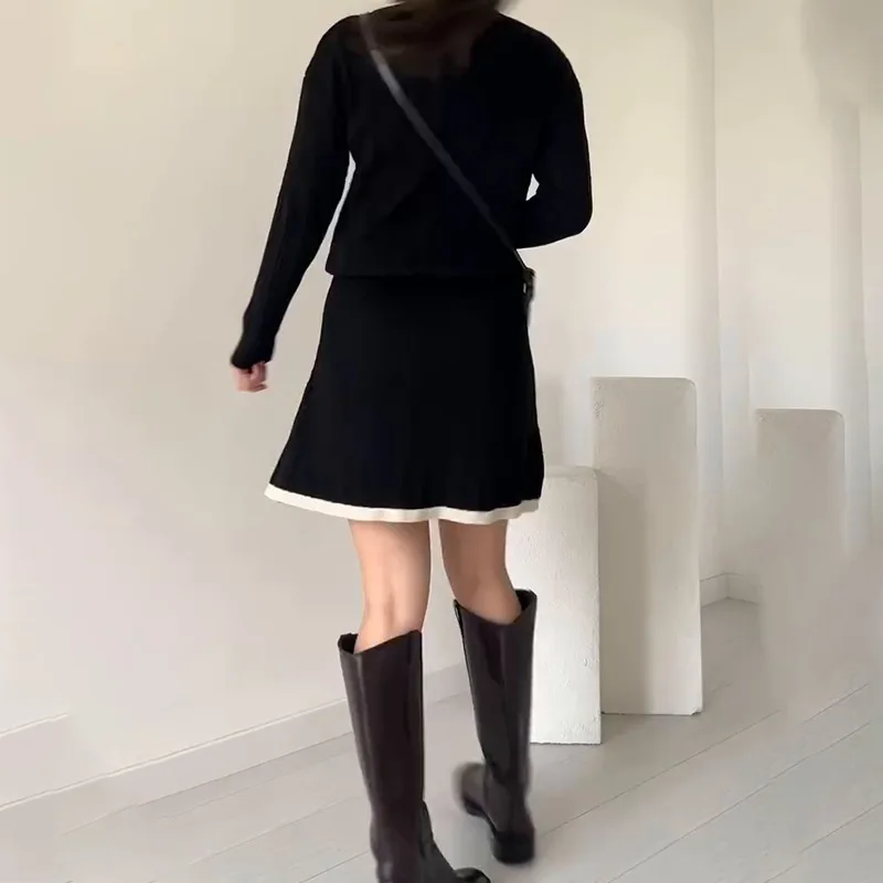 Ropa de mujer de comercio exterior europeo y americano otoño nuevo cuello POLO empalme Falda corta conjunto de suéter de punto de moda