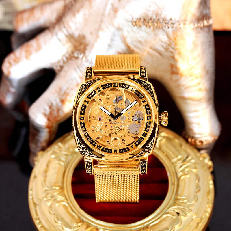 

A men's gold mesh strap business fashion carved full automatic tourbillon mechanical watch
