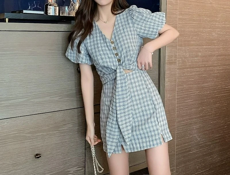 

2025 Summer New Age Reducing Niche V-neck Top Plaid Hip Hugging Half Skirt Small Two-piece Set Skirt