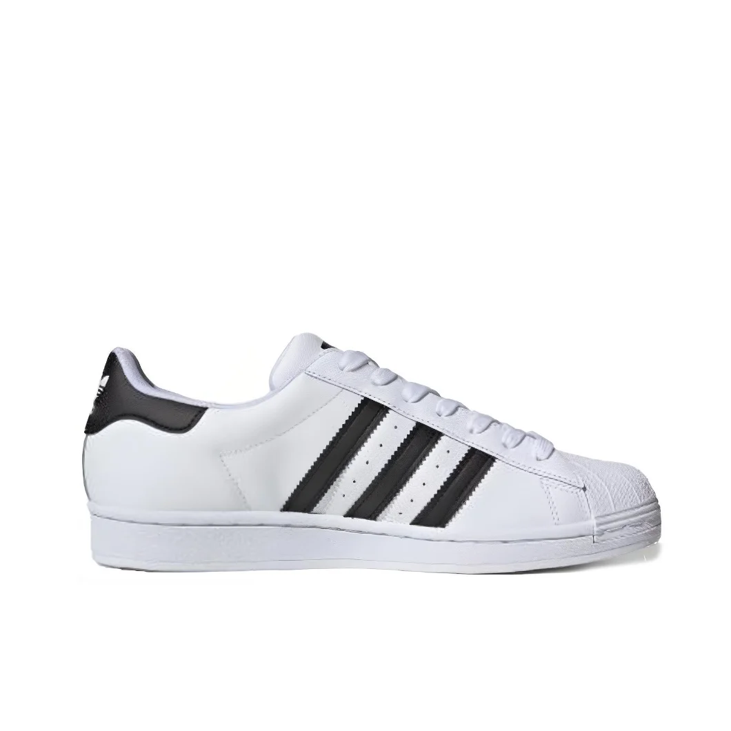 حذاء كاجوال Adidas Superstar للرجال والنساء متعدد الاستخدامات وبسيط ومنخفض الارتفاع ومطابق للألوان باللونين الأسود والأبيض