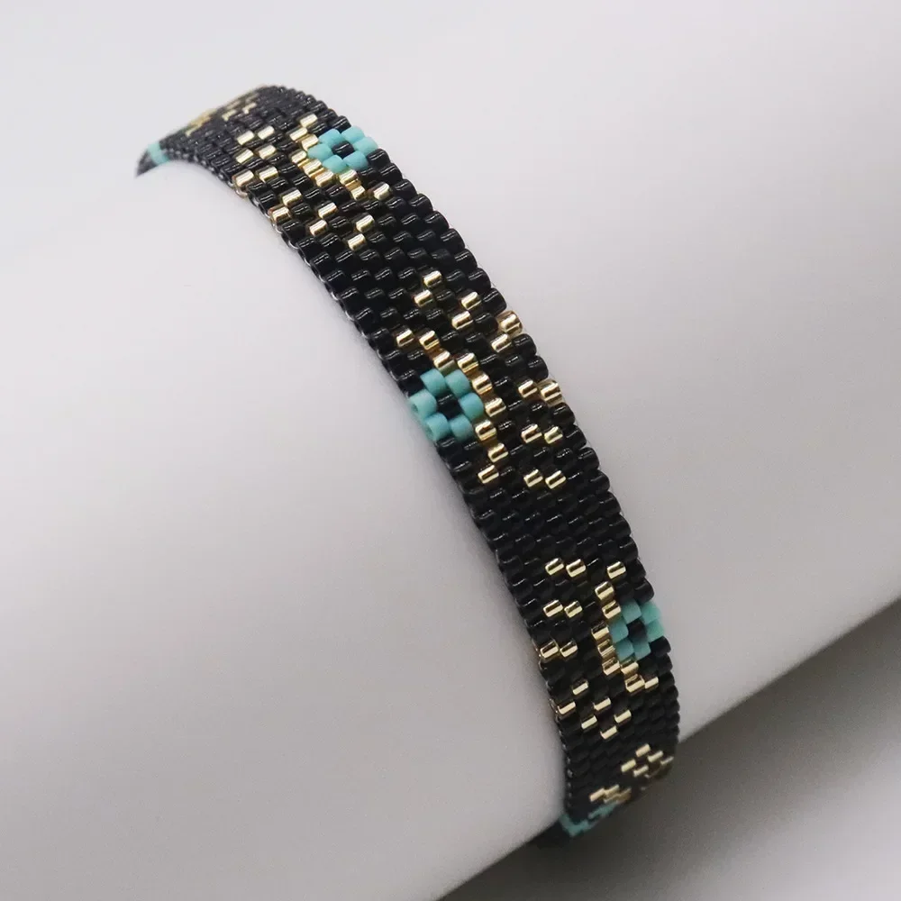 ZGMXR Rice bead bracelet Originality Devil's eye Bohemia Black Design Hand knitting Adjustable Fashion Simple Beaded bracelet
