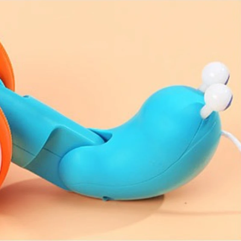 

Multi-Sensory Pull Toy: Light/sound activated by movement, stimulates visual/auditory/tactile coordination in toddlers