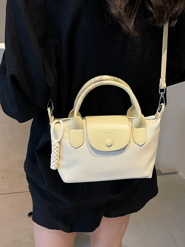 

2025 New Oxford Women's Bag Luxury Brand Designer Buckets Multi-Color Dumpling Dragon Bags Trendy Shoulder bag Xiang Handbag
