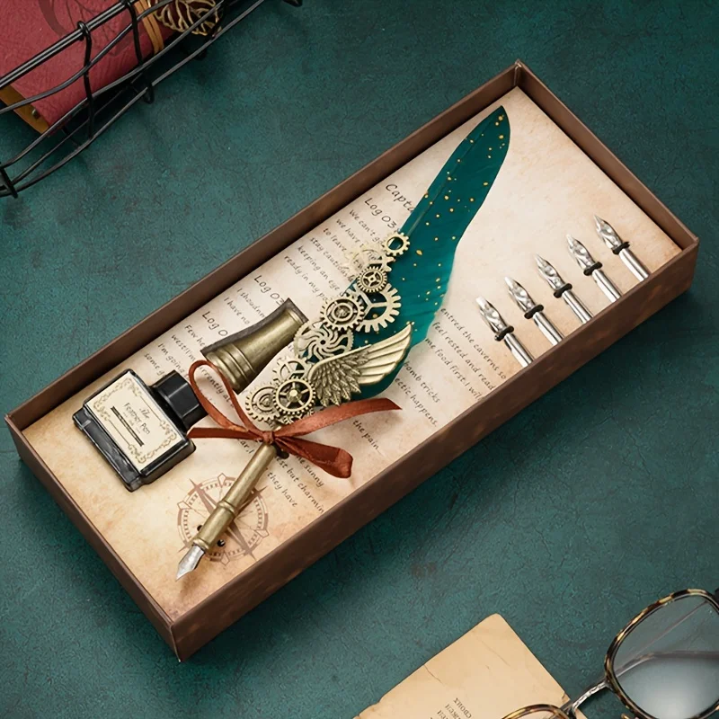 Set of pens, stamps, crayons. Calligraphy pen and ink pen set. Dip pen with mechanical gears and steampunk design.