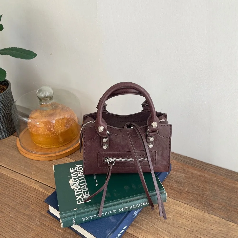 Leather Messenger Bag Women's 2026 New First-layer Cowhide Mini Locomotive Bag Versatile Shoulder Texture Unique Fashion Small