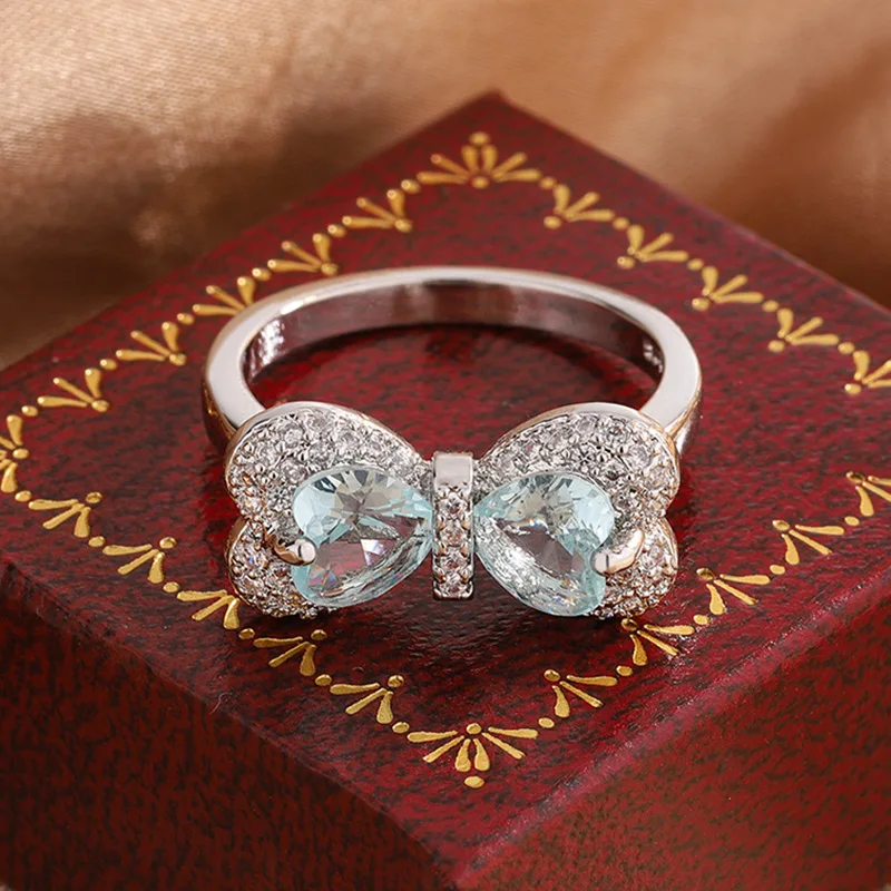 

Elegant, Fresh and Authentic S925 Silver Light Green Zircon Bow Ladies Wedding Ring