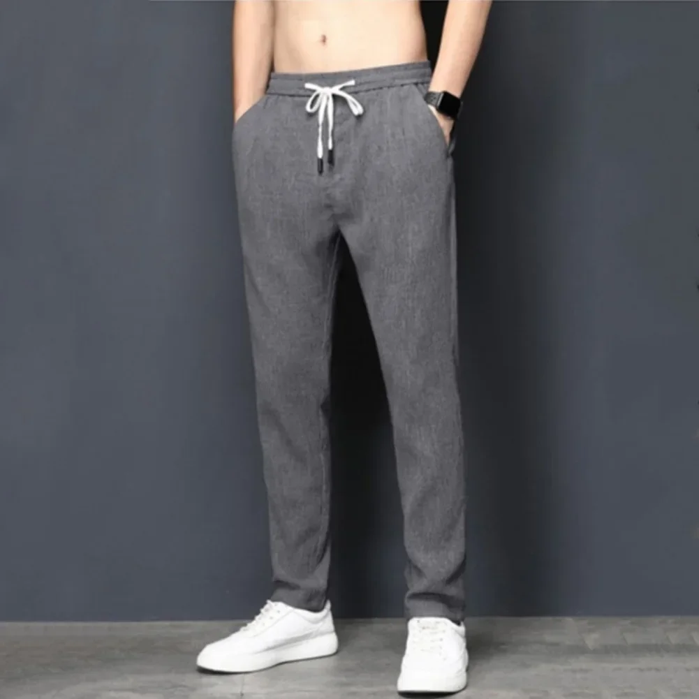 

Men Stretch Waist Loose Straight Leg Sports Jogging Pants Pleated Gym Bodybuilding Workout Fitness Trousers Cropped Male Pants