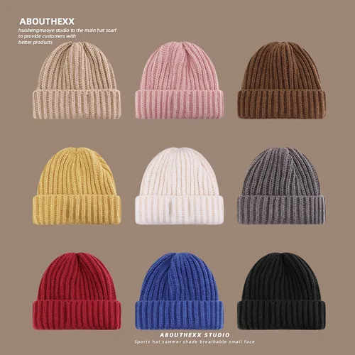 Imagen 2 del producto Otoño e Invierno Simple suéter suelto sombrero hombres y mujeres Color sólido tejido áspero a prueba de frío protección para los oídos gorros con calavera