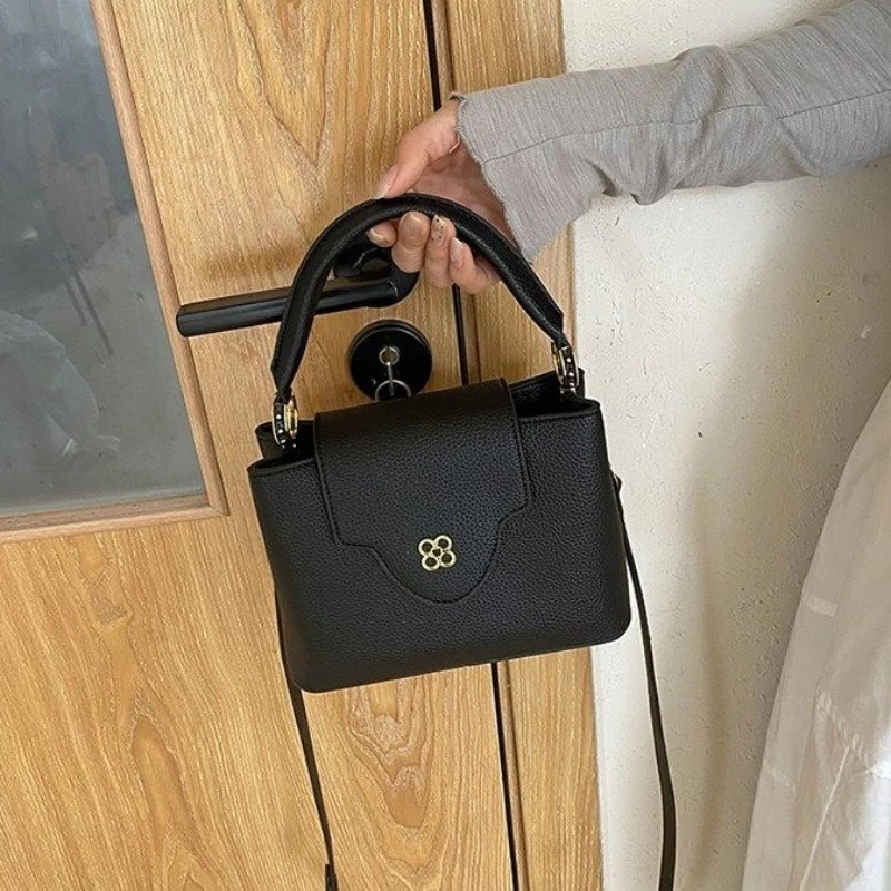 

2026 New Grain Leather Top Handle Bag, Women's Minimalist Crossbody Shoulder Purse with Gold Flower Accent