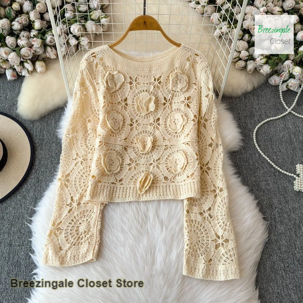 

French three-dimensional flower hollowed-out solid color knitted short-sleeved women's spring and summer fashion design top