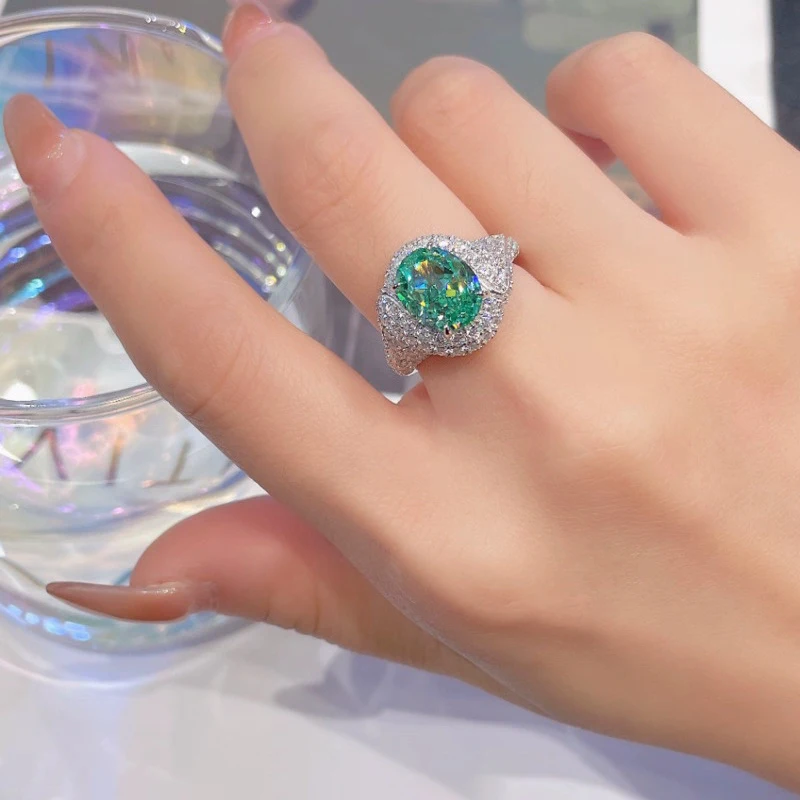 Gold-plated copper ring fully inlaid with oval synthetic Paraiba blue-green zircon, open ring, wholesale customization