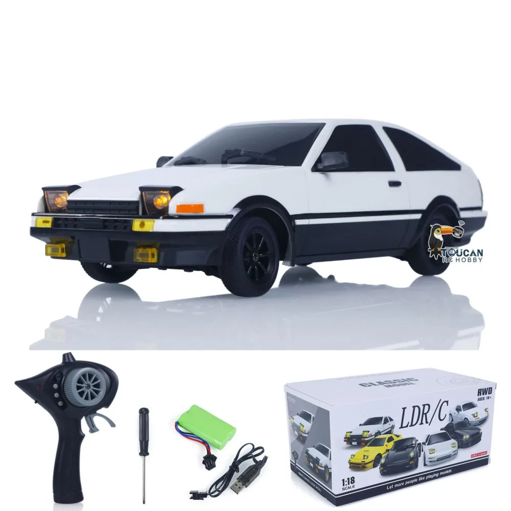 Venda nos eua 1/18 ldrc 2.4g carro de deriva de controle remoto ae86 modelo rwd veículos de corrida alta velocidade 10 km/h flip luz bateria carga usb