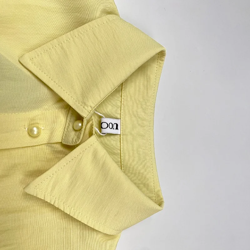 فساتين حفلات صفراء أنيقة ذات ياقة طية صدر السترة فساتين متوسطة الطول موضة فضفاضة بأزرار مطوي بلون سادة فستان قميص نسائي غير رسمي