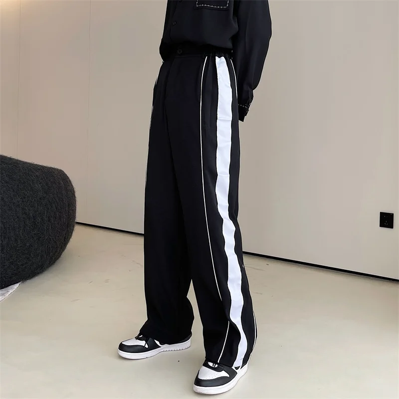 

Новые мужские повседневные брюки серии Spring Sle k: модные, с высокой талией, прямым кроем, свободные, с элементами пэчворка и вставками.