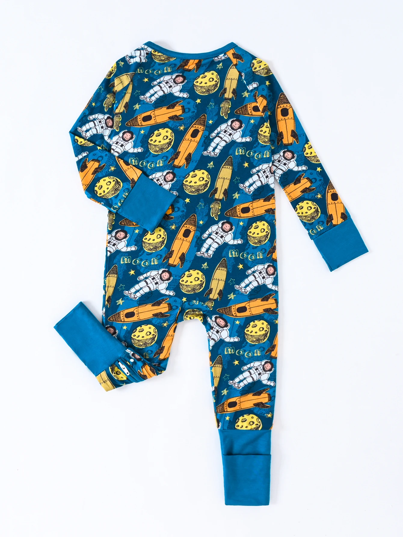 Baby romper made of soft and breathable bamboo fiber fabric with rocket and moon prints reversible foot covers double zippers