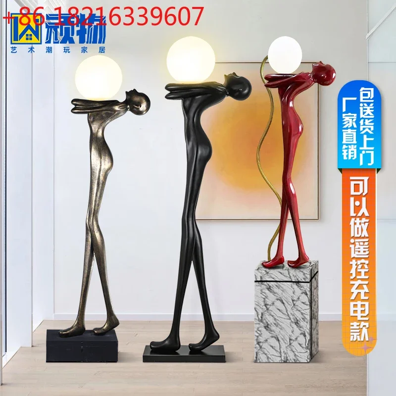 

Декоративная скульптура в виде фигуры, напоминающая большую напольную лампу для саморазвития, украшение в стиле интернет-знаменитостей.