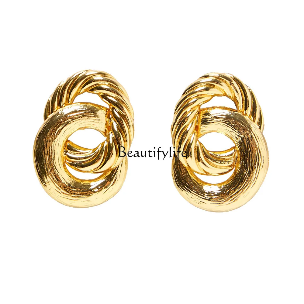 

Retro exaggerated winding earrings show small face, versatile personality, European and American style